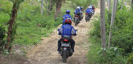 Suspensi belakang dengan sistem Pro-Link dan ban lebih besar 